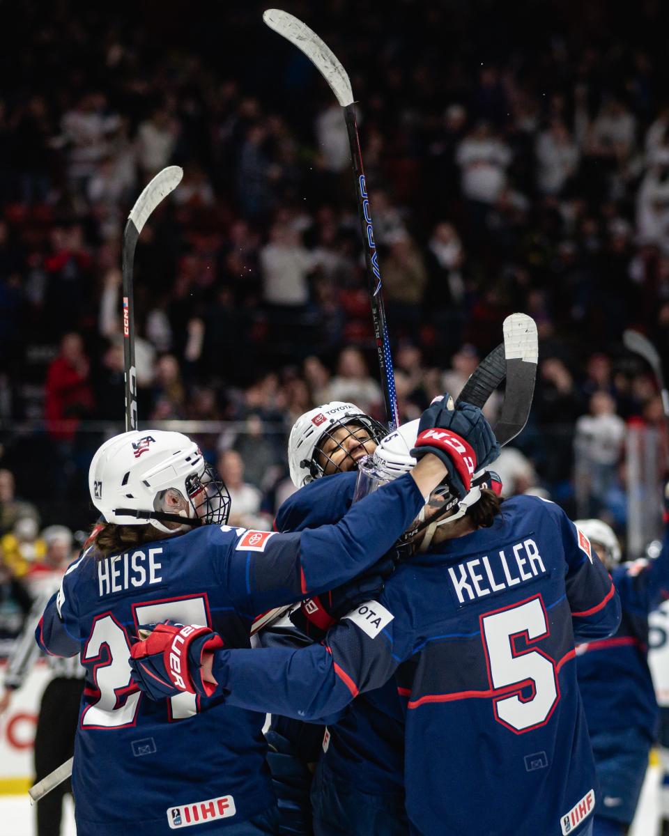 Team USA's Laila Edwards celebrates with teammates after completing her hat trick against Finland at the Adirondack Bank Center in Saturday's IIHF Women's World Championship semifinals. Team USA plays for gold Sunday.