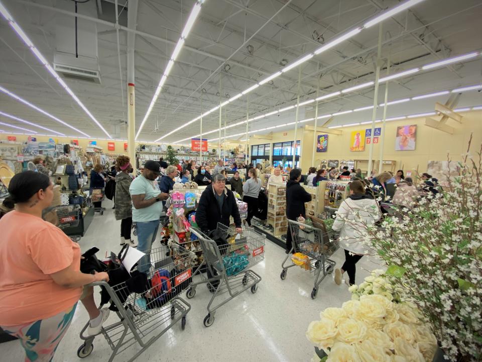 Shoppers wait in line to checkout at the Hobby Lobby in Christiana. The store opened Friday morning with a line of 75 to 100 guests waiting outside.