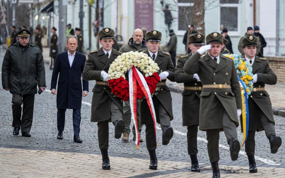 The prime ministers visited the city's memorial to soldiers killed fighting Russia