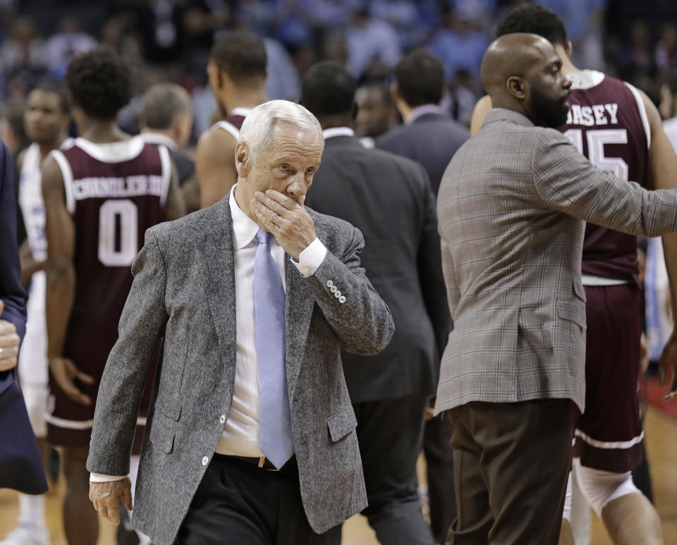 North Carolina head coach Roy Williams walks off the court after a second-round loss against Texas A&M in the NCAA tournament Sunday. (AP Photo/Gerry Broome)