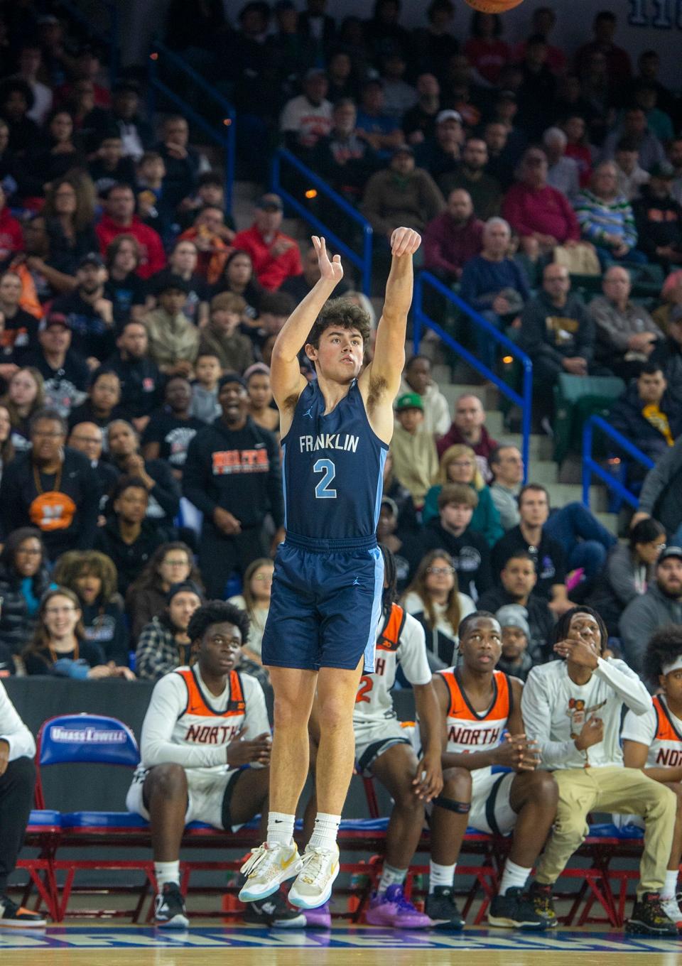 Franklin High School senior captain Andrew O'Neill launches a jump shot against Worcester North in the Div. 1 state boys basketball final at the Tsongas Center in Lowell, March 17, 2024.
