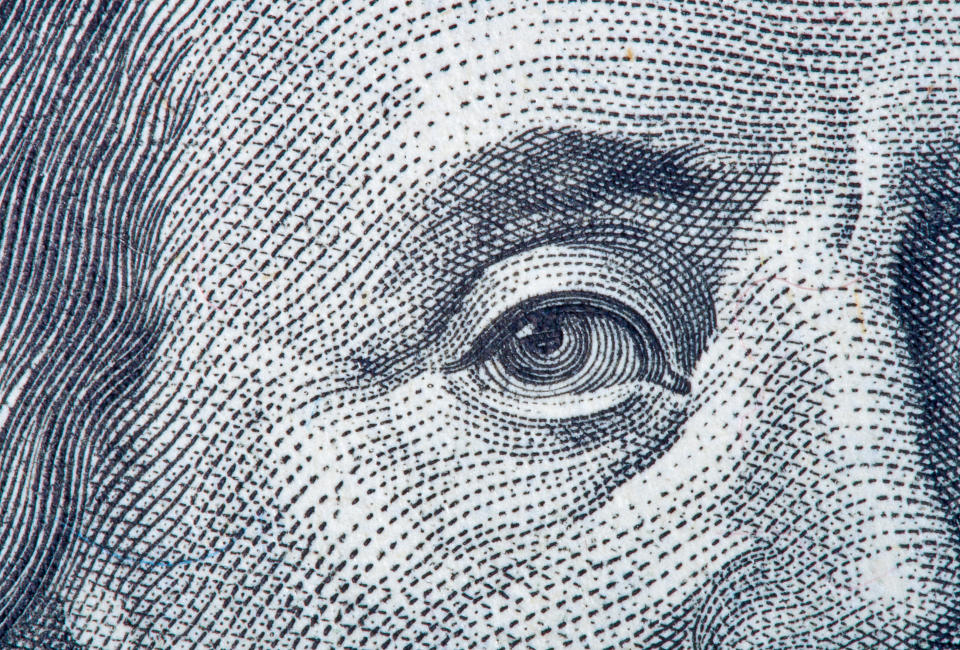 Portrait fragment of Benjamin Franklin close-up from one hundred dollar bill
