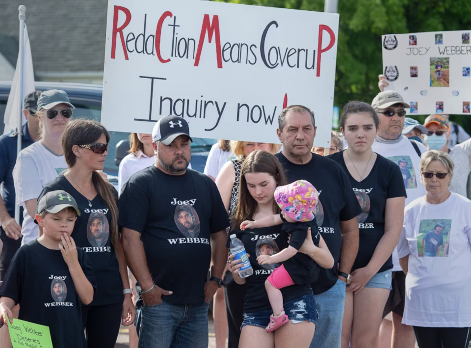 Family and friends of victim Joey Webber attend a march demanding an inquiry into the April mass shooting in Nova Scotia that killed 22 people, in Bible Hill, N.S. on Wednesday, July 22, 2020. (Andrew Vaughan/The Canadian Press)