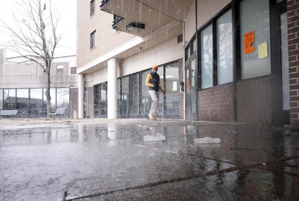 Water splashes on the ground from a burst pipe Thursday outside the Latitude Five25 apartment complex, 525 Sawyer Blvd., on Columbus' Near East Side.