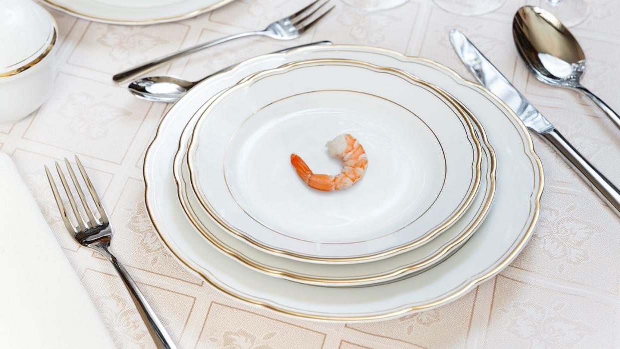 a plate with a carrot on it