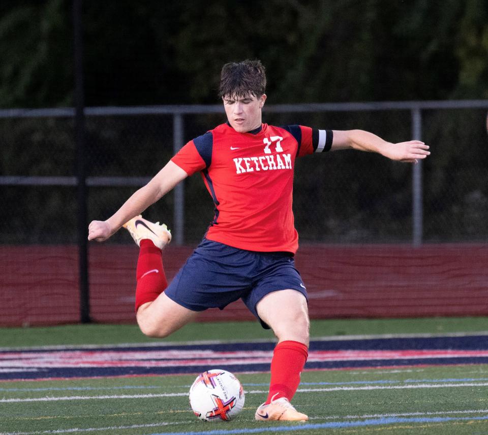 Ketcham's Aiden McLaughlin readies to send a pass up field against Arlington during an Oct. 11, 2023 boys soccer match.