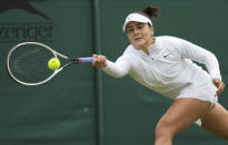 Canada's Bianca Andreescu plays a return to Alize Cornet of France during the women's singles first round match on day three of the Wimbledon Tennis Championships in London, Wednesday June 30, 2021. (AP Photo/Alberto Pezzali)