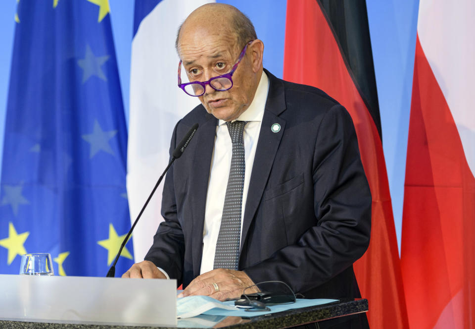 FILE - In this Friday, Sept. 10, 2021 file photo, French Foreign Minister Jean-Yves Le Drian speaks in Weimar, Germany. France said late Friday, Sept. 17 it was immediately recalling its ambassadors to the U.S. and Australia after Australia scrapped a big French conventional submarine purchase in favor of nuclear subs built with U.S. technology. Foreign Minister Jean-Yves Le Drian said in a written statement that the French decision, on request from President Emmanuel Macron, “is justified by the exceptional seriousness of the announcements” made by Australia and the United States.(Jens Schlueter/Pool Photo via AP, file)