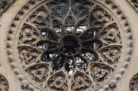 One of the cathedral's famed rose windows is blakened, but the stonework is intact. An investigation into the origin of the blaze is ongoing, but for now, officials are treating it as an accident, not a deliberate act.