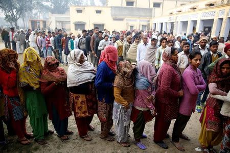 People queue to vote during the state assembly election, in the town of Deoband, in the state of Uttar Pradesh, India, February 15, 2017. REUTERS/Cathal McNaughton