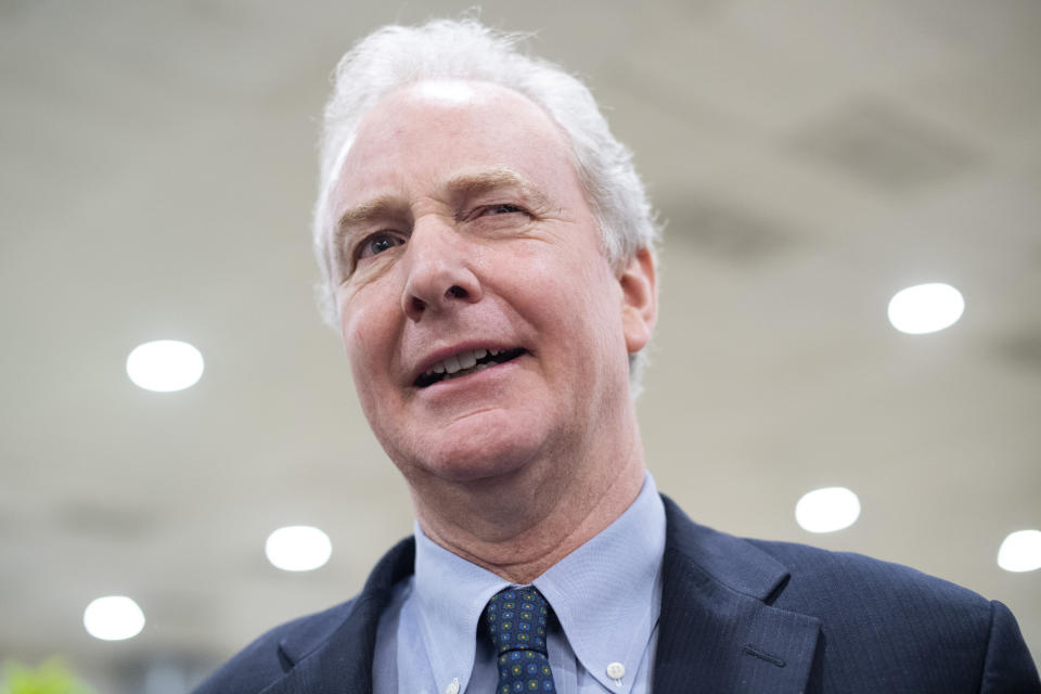 Sen. Chris Van Hollen, D-Md., talks with reporters in the Capitol's senate subway on Thursday, March 12, 2020. (Tom Williams/CQ Roll Call via Getty Images)