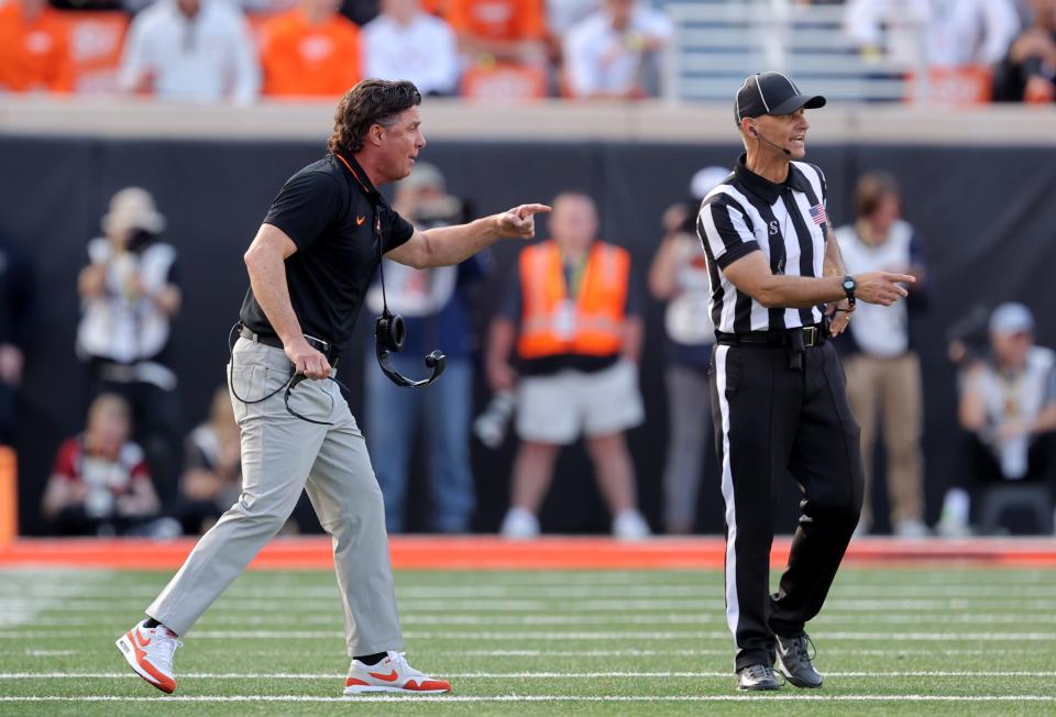 Oklahoma State head football coach Mike Gundy argues a call during a Bedlam college football game between the Oklahoma State University Cowboys (OSU) and the University of Oklahoma Sooners (OU) at Boone Pickens Stadium in Stillwater, Okla., Saturday, Nov. 4, 2023.