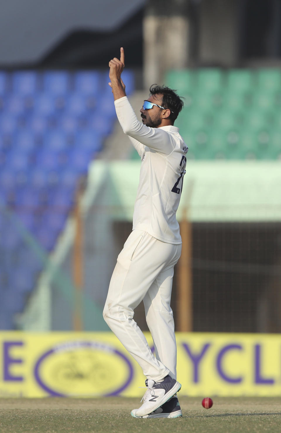 India's Axar Patel celebrates the wicket of Bangladesh's Nurul Hasan during the day four of the first Test cricket match between Bangladesh and India in Chattogram, Bangladesh, Saturday, Dec. 17, 2022. (AP Photo/Surjeet Yadav)