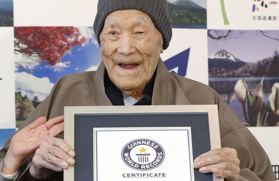 Nonaka pictured with his Guinness World Record certificate for being the oldest man at age 112 in April, 2018. Source: AAP