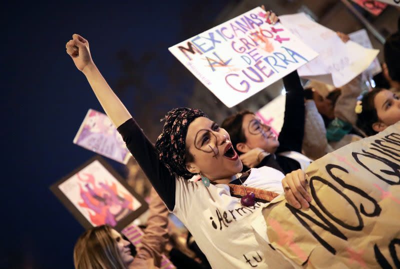 Women take part in a protest to mark the International Women's Day in Barcelona