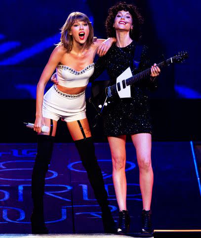 <p>Christopher Polk/TAS/Getty</p> Taylor Swift and St. Vincent performing during the 1989 World Tour in Los Angeles in August 2015