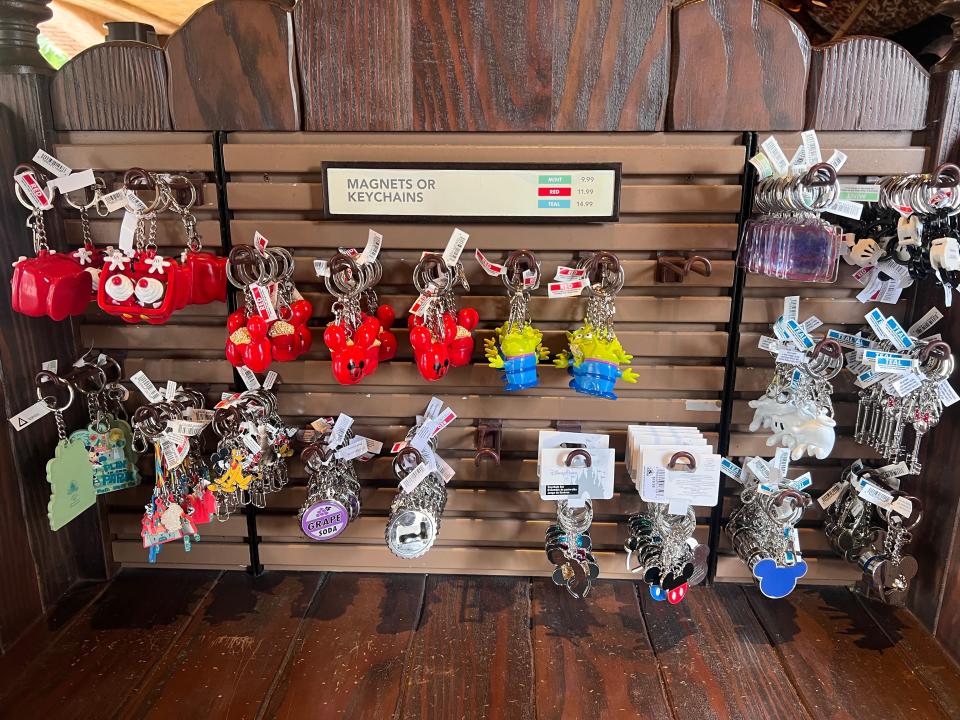 display of disney keychains at a disneyland gift shop