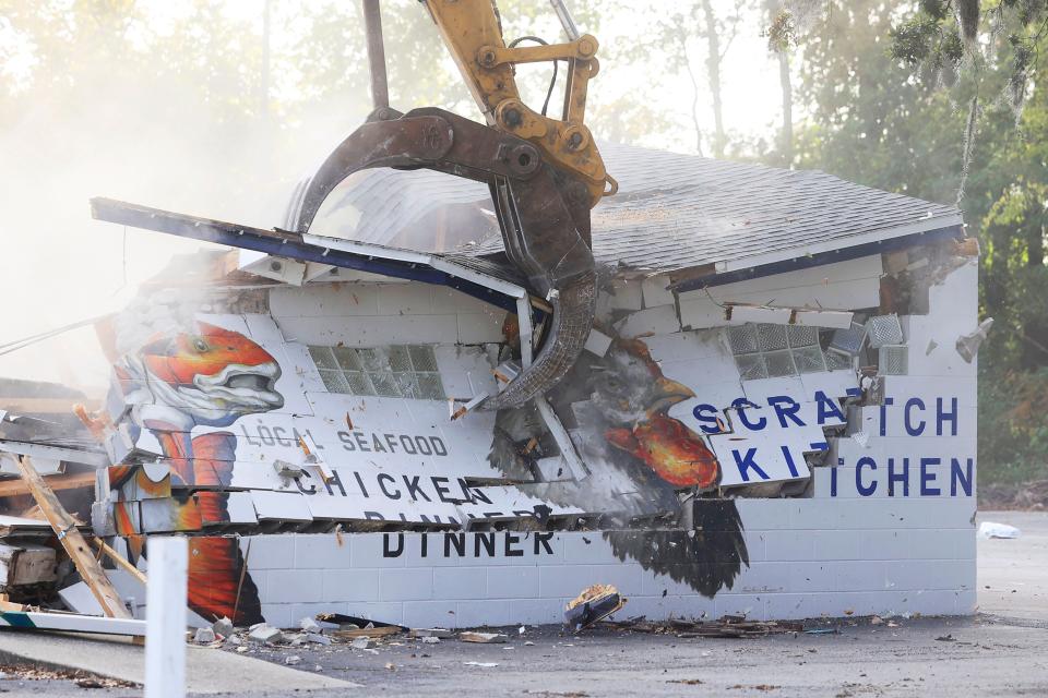 The closed-down Beach Road Fish House & Chicken Dinners restaurant is demolished to make way for a 270-unit apartment community there and on neighboring property.