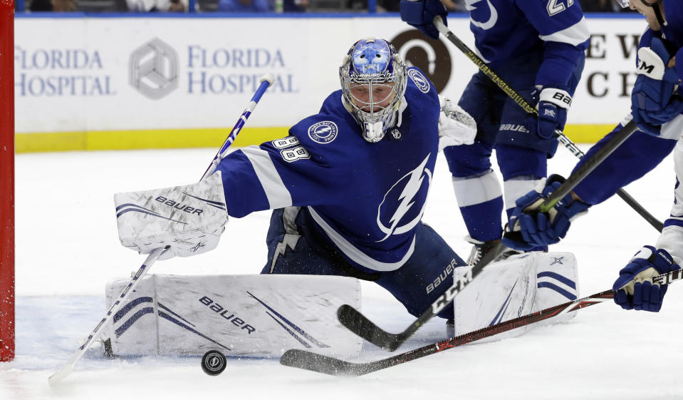 Tampa Bay Lightning goaltender Andrei Vasilevskiy (88) makes a save on a shot by the Toronto Maple Leafs during the first period of an NHL hockey game Thursday, Dec. 13, 2018, in Tampa, Fla. (AP Photo/Chris O'Meara)