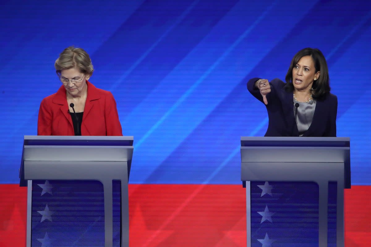 Thumbs down: Senator Elizabeth Warren, left, and Vice President Kamala Harris at a Democratic presidential debate at Texas Southern University in September 2019 (Getty Images)