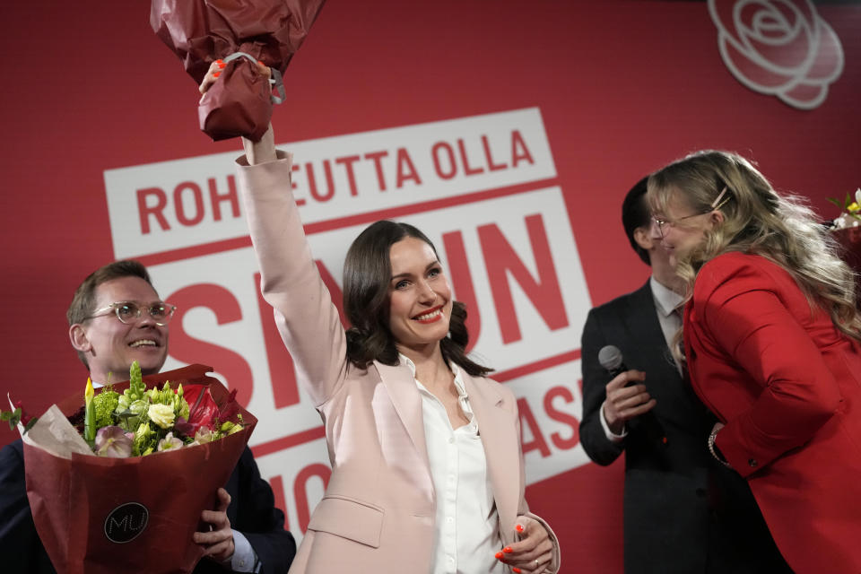 Finnish Prime Minister Sanna Marin, Social Democratic Party cheers her supporters during an election party in Helsinki, Finland, Sunday, April 2, 2023. Finland's center-right National Coalition Party claimed victory with 97.7% of votes counted in an extremely tight three-way parliamentary race. They appeared to beat the ruling Social Democrats led by Prime Minister Sanna Marin. (AP Photo/Sergei Grits)