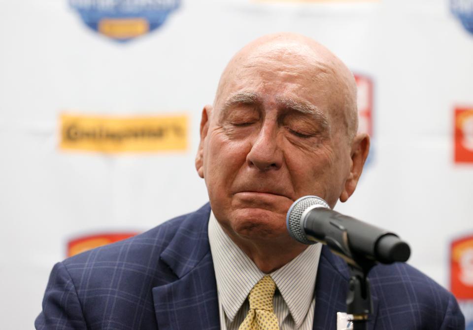 ESPN college basketball analyst Dick Vitale becomes emotional, returning to the sidelines as he battles cancer.