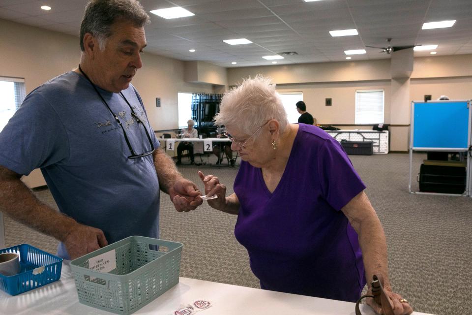 Local residents cast their votes in the Ohio election inside of the Pleasant Township Fire Department on November 8, 2023, in Lancaster, Ohio,