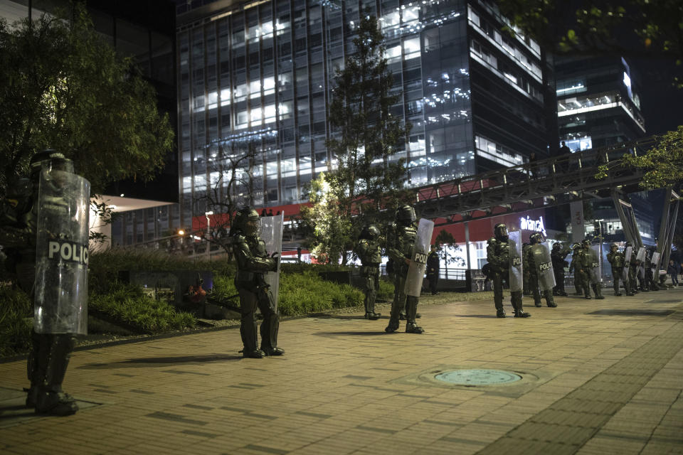 Police guard the Israeli embassy during a protest for the Palestinian people in the latest Israel-Hamas war, in Bogota, Colombia, Thursday, Oct. 19, 2023. (AP Photo/Ivan Valencia)