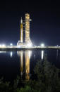 The NASA Artemis rocket with the Orion spacecraft aboard leaves the Vehicle Assembly Building moving slowly to pad 39B at the Kennedy Space Center in Cape Canaveral, Fla., Tuesday, Aug. 16, 2022. NASA is aiming for an Aug. 29 liftoff for the lunar test flight. (AP Photo/Terry Renna)