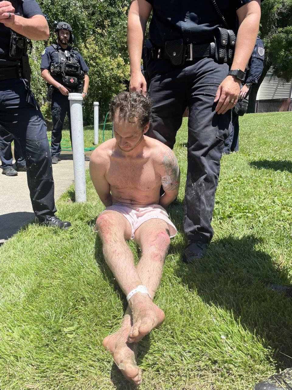 Eric Abril is seen handcuffed Monday following his capture in Rocklin after being on the run for 36 hours. The murder suspect had escaped from custody at Roseville Sutter Medical Center on Sunday morning before being found in Antelope Creek, about 3 miles from the hospital. Placer County Sheriff's Office