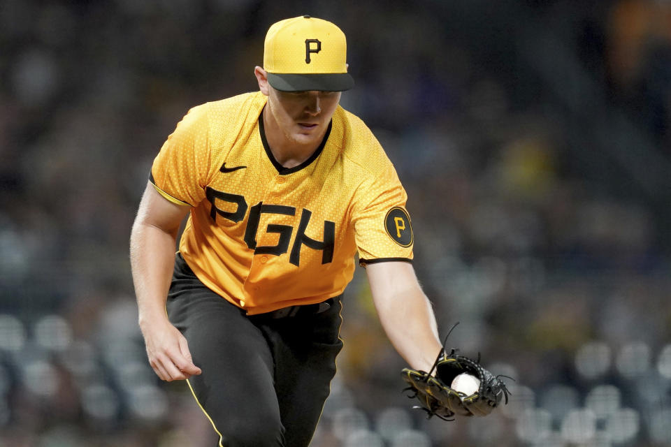 Pittsburgh Pirates starting pitcher Mitch Keller fields a groundout hit by Chicago Cubs' Nico Hoerner in the eighth inning of a baseball game in Pittsburgh, Friday, Aug. 25, 2023. (AP Photo/Matt Freed)