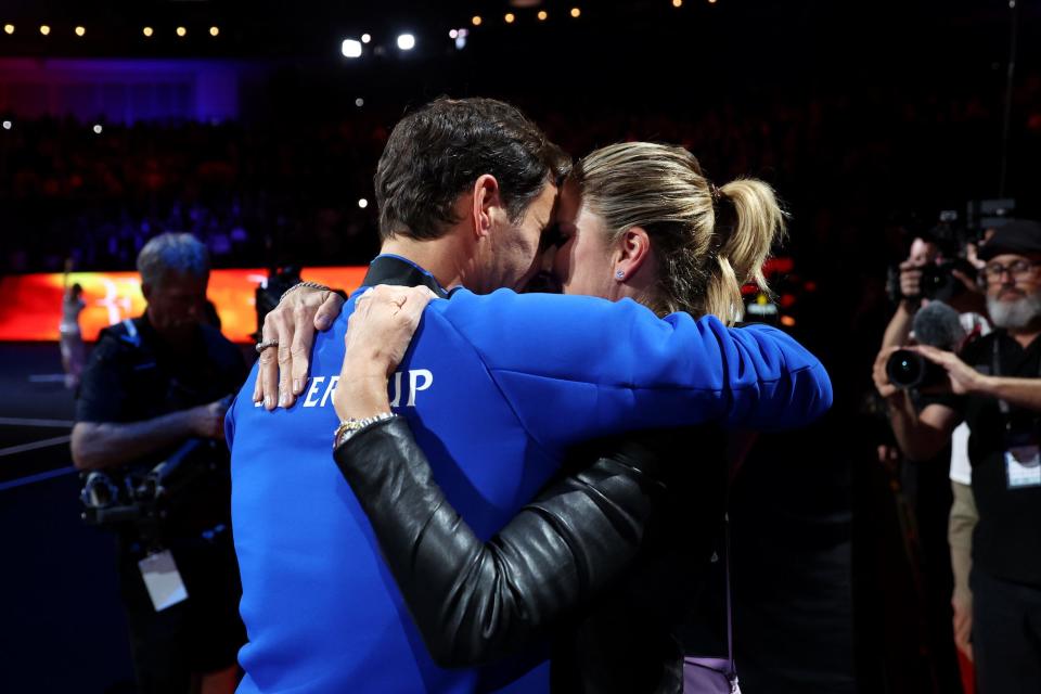 Roger Federer of Team Europe shows emotion as they embrace Partner, Mirka Federer the crowd following their final match during Day One of the Laver Cup at The O2 Arena.