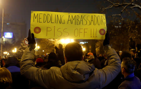 Supporters of the movement boycotting the deal with neighboring Greece to change the country's name to the Republic of North Macedonia protest in front of the parliament building during parliamentary debates on constitutional amendments related to the name change, in Skopje, Macedonia January 11, 2019. REUTERS/Ognen Teofilovski