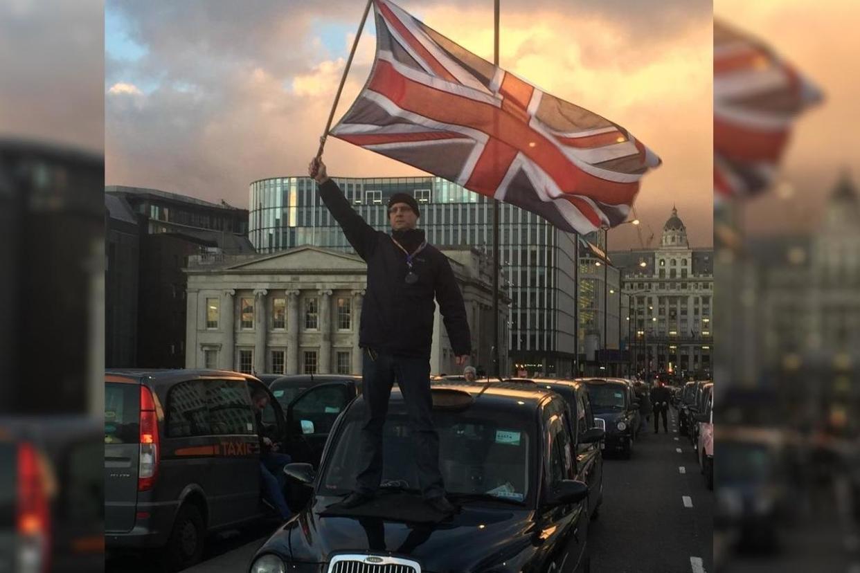 One cabbie mounted his vehicle with a British flag: @DE4N1