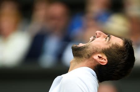 Tennis - Wimbledon - London, Britain - July 14, 2017 Croatia’s Marin Cilic reacts during his semi final match against Sam Querrey of the U.S. REUTERS/Toby Melville
