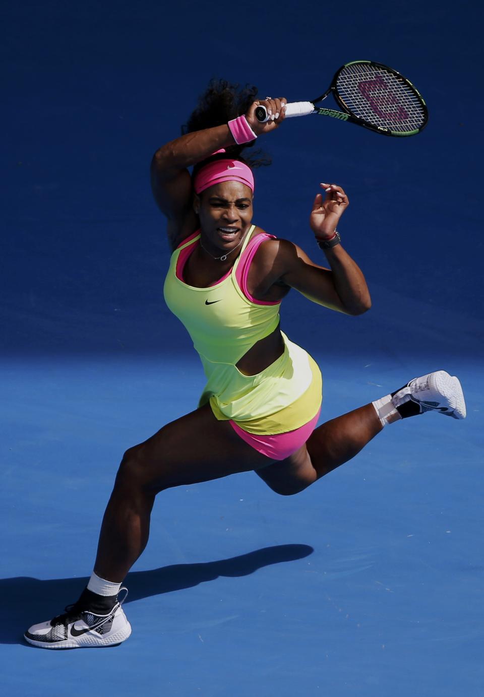 Serena Williams of the U.S. hits a return to compatriot Madison Keys during their women's singles semi-final match at the Australian Open 2015 tennis tournament in Melbourne January 29, 2015. REUTERS/Carlos Barria (AUSTRALIA - Tags: SPORT TENNIS)