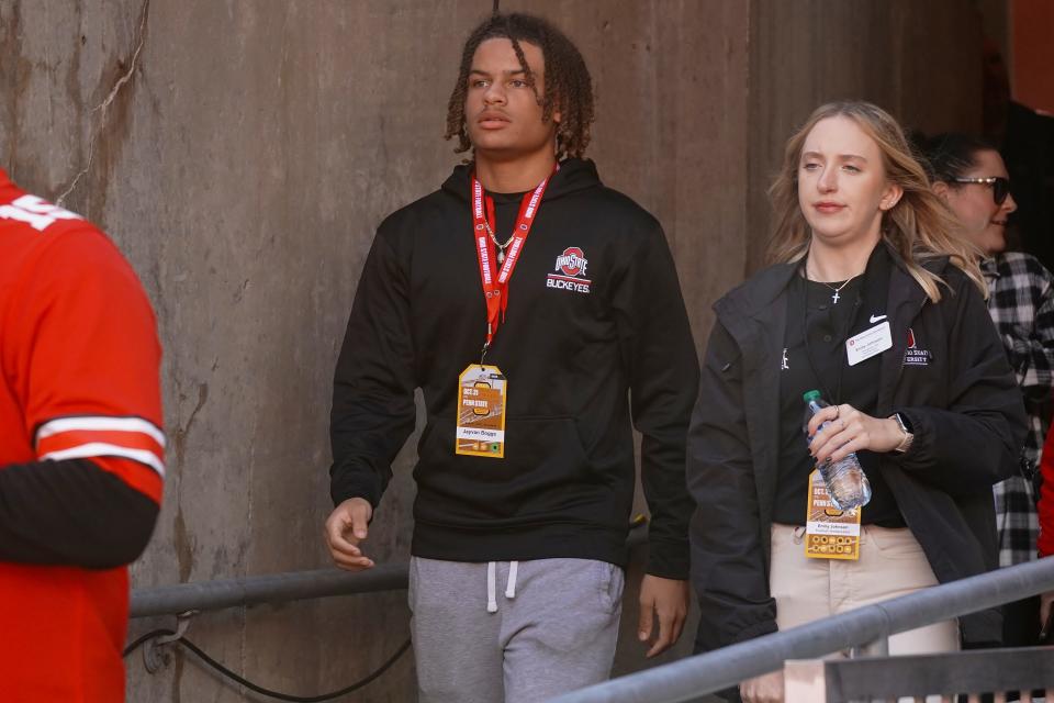 Recruit Jayvan Boggs watches Ohio State warm up before playing Penn State Oct. 21, 2023 at Ohio Stadium.