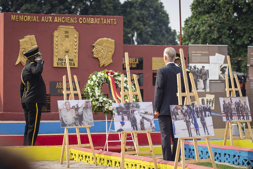 King Philippe of Belgium lays a wreath during a ceremony at the Veterans Memorial in Kinshasa, Democratic Republic of the Congo, Wednesday June 8, 2022. King Philippe is on the second day of his six-day visit. (AP Photo/Samy Ntumba Shambuyi)
