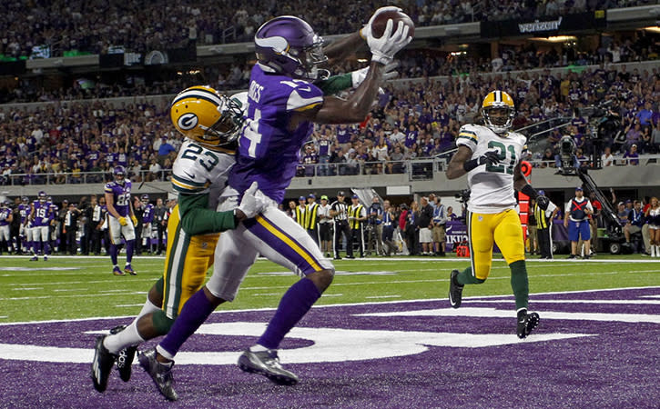 Sep 18, 2016; Minneapolis, MN, USA; Minnesota Vikings wide receiver Stefon Diggs (14) catches a touchdown pass past Green Bay Packers cornerback Damarious Randall (23) in the third quarter at U.S. Bank Stadium. The Vikings win 17-14