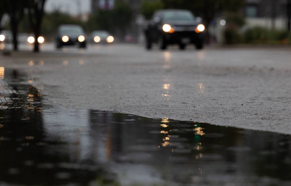 Cars travel on wet roads during a rainstorm Monday, Oct. 24, 2022, in Fort Worth.