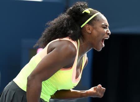 Aug 11, 2015; Toronto, Ontario, Canada; Serena Williams of the United States reacts after a shot against Flavia Pennetta of Italy (not pictured) during the Rogers Cup tennis tournament at Avival Centre. Dan Hamilton-USA TODAY Sports