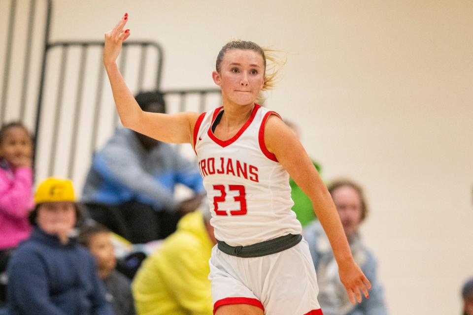 Center Grove High School junior Ava Grant (23) reacts after hitting a 3-point basket during the second half of an IHSAA Class 4A Sectional championship basketball game against Mooresville High School, Saturday, Feb. 3, 2024, at Mooresville High School. Center Grove won 61-41.