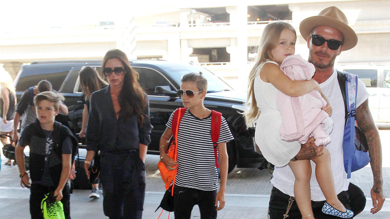 Mandatory Credit: Photo by Broadimage/Shutterstock (5016818b)Victoria Beckham, Romeo Beckham, Cruz Beckham, David Beckham and Harper BeckhamDavid Beckham and Victoria Beckham at LAX International Airport, Los Angeles, America - 31 Aug 2015.