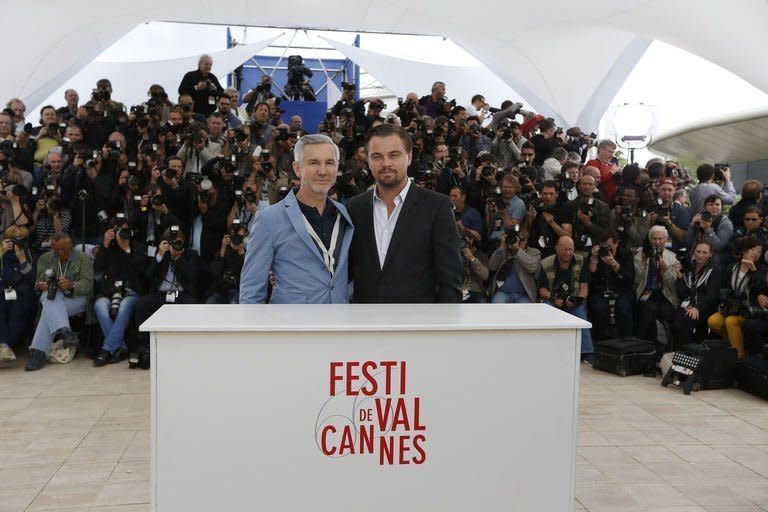 Australian director Baz Luhrmann (L) and US actor Leonardo DiCaprio pose on May 15, 2013 during a photocall for their film "The Great Gatsby" ahead of the opening of the Cannes Film Festival on May 15, 2013 in Cannes. "The Great Gatsby" is set to kick off the world's most prestigious film festival late Wednesday