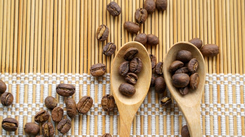 Coffee beans and wooden spoons