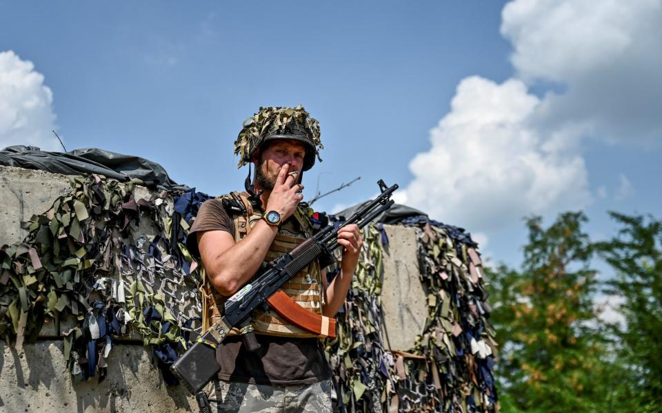 A Ukrainian service member near a frontline in the Zaporizhzhia region - REUTERS