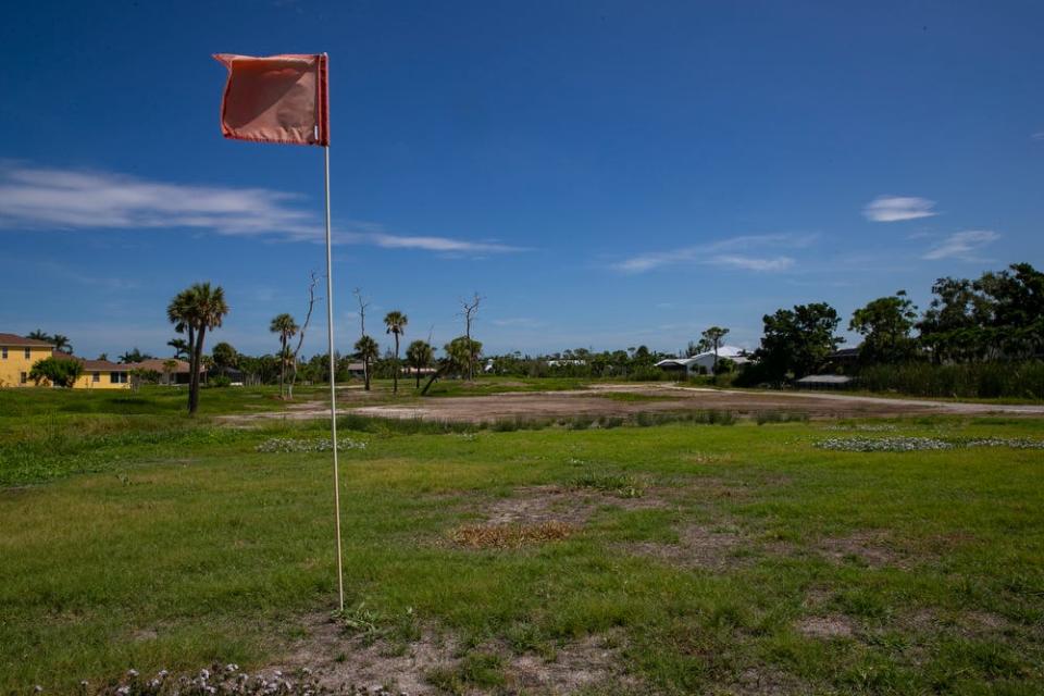 View of the 9th green at Alden Pines Golf Course in Bokeelia which has remained closed after suffering extensive damage from Hurricane Ian. Lee County resident Scott Snyder organized a group of property owners from the Pineland neighborhood to band together in order to keep its golf course from being sold for development along Pine Island's historic mangrove fringe, once the native Calusa's capital.