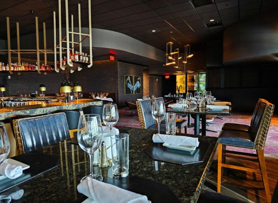The dining area on the second floor with a bar centering the space has a bit more casual approach at Ruth's Chris Steak House in West Des Moines.