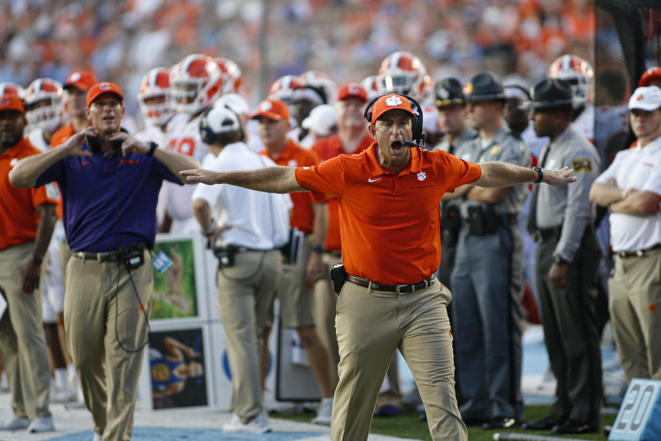 Clemson Tigers head coach Dabo Swinney argues for an incomplete pass call against the North Carolina Tar Heels in the second half at Kenan Memorial Stadium. The Clemson Tigers won 21-20. (USAT)