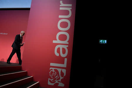 Britain's opposition Labour party leader Jeremy Corbyn leaves the stage during the Labour party Conference in Brighton, Britain, September 24, 2017. REUTERS/Toby Melville